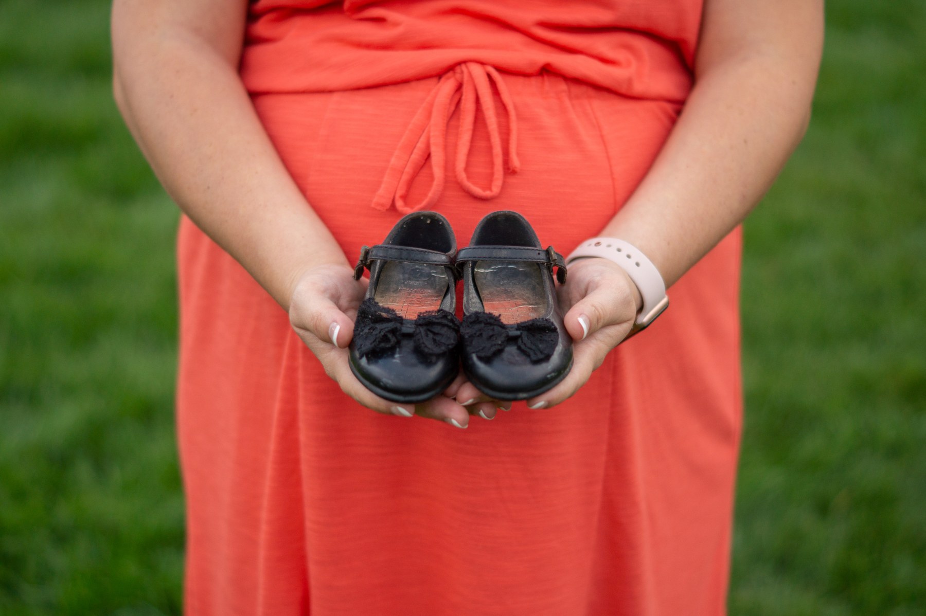Tiny baby shoes marking a milestone, Fort Collins newborn photography